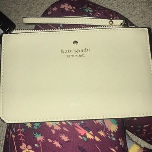 Kate Spade cream colored wristlet
